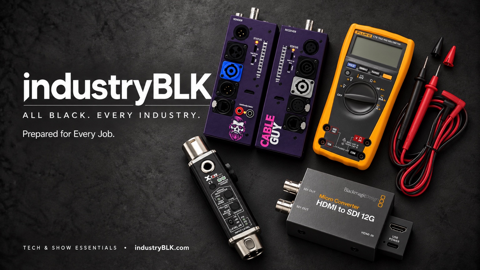 IndustryBLK Tech & Show Essentials showcase with cable testers, multimeter and signal-conversion gear